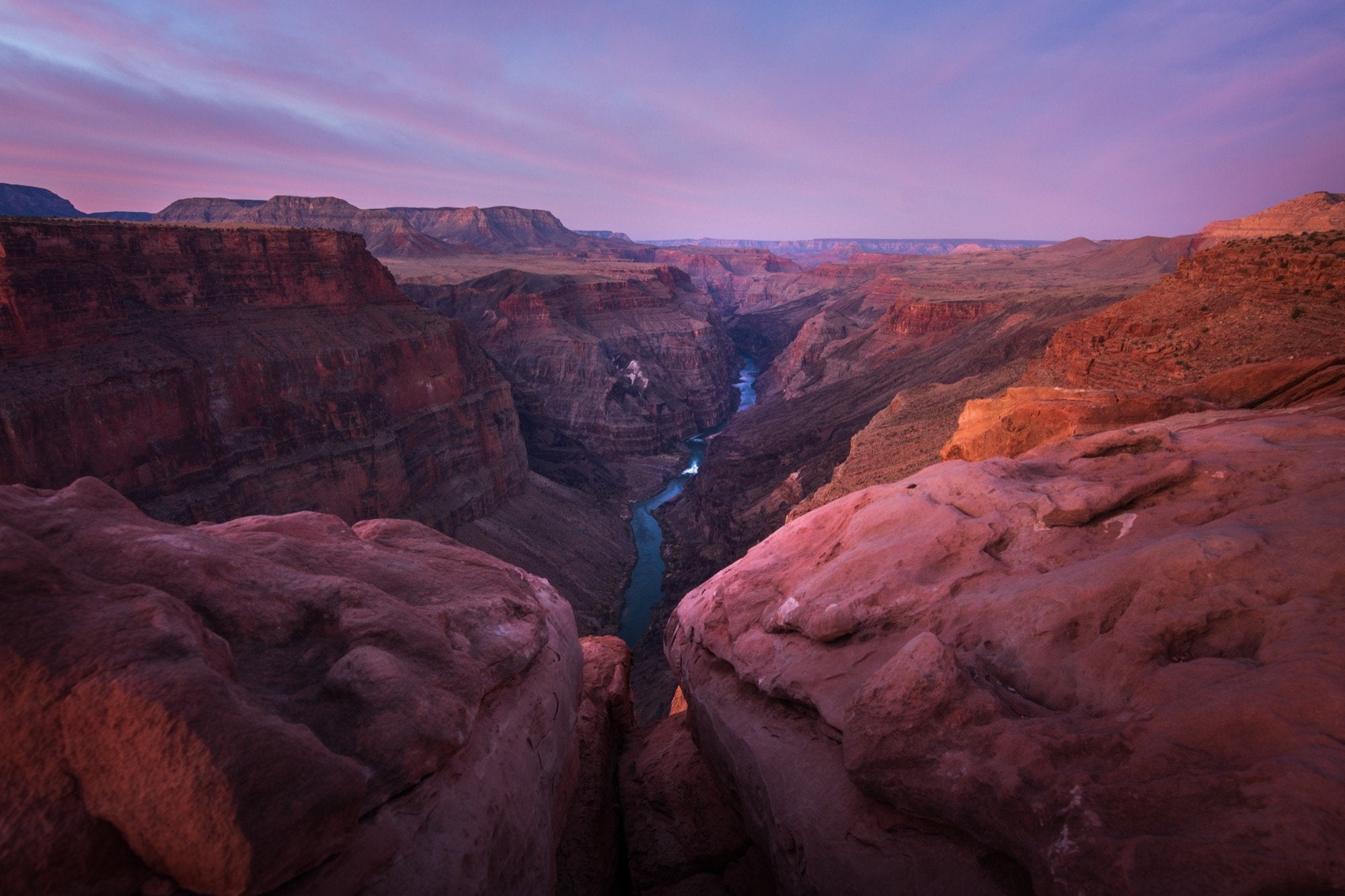 Colorado River winding through the Grand Canyon at dusk, viewed from Toroweap, Arizona
